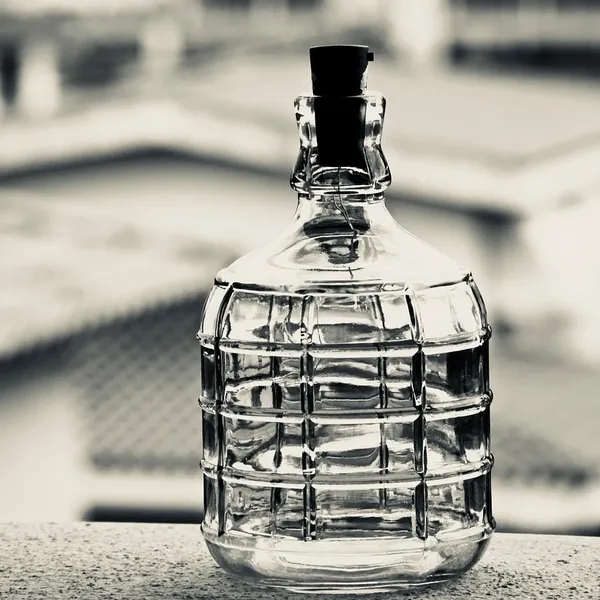 Acqua Di Pharma Perfume Bottle On The Yellow Table